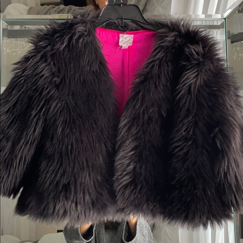 Cruelia Deville black faux fur jacket.